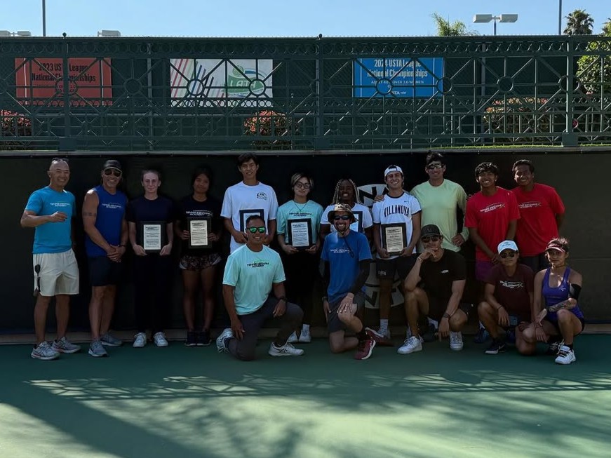 TMX students holding recognition plaques
