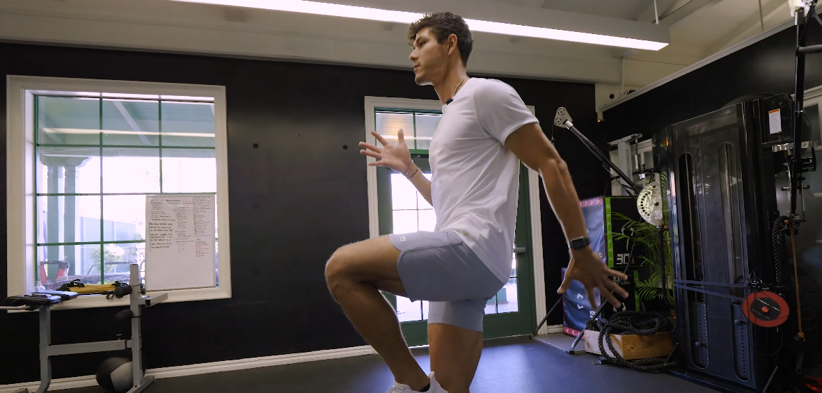 Fitness coach displaying the correct form for workout
