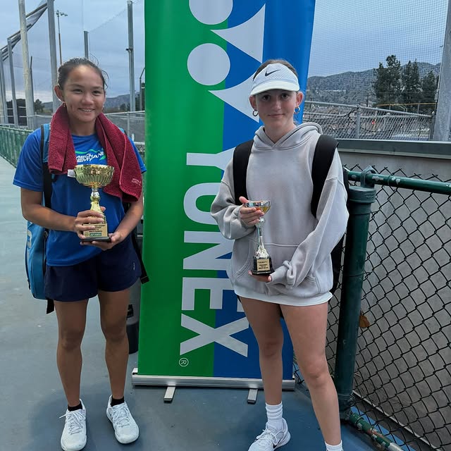 Tournament winner and runner up with trophies