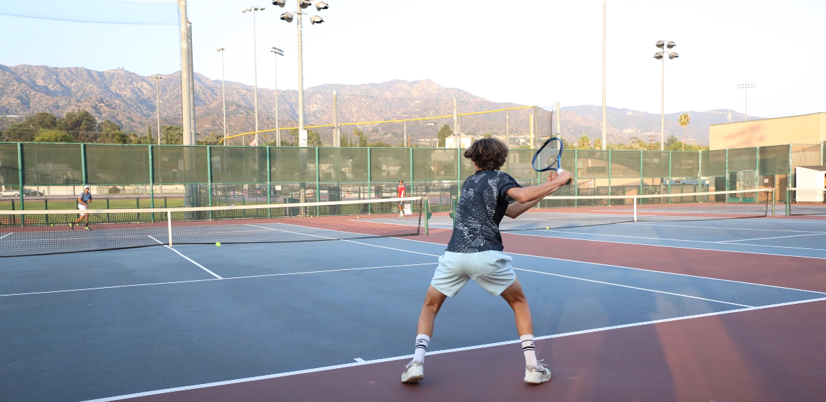 Student returning a serve